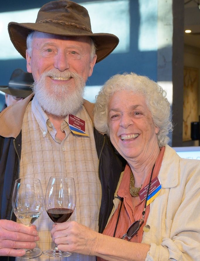Pam & Jim Photo of couple with wine