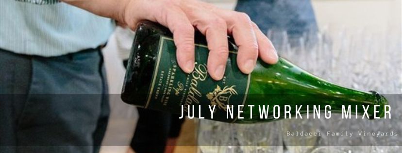 Sparkling wine bottle with the words July Networking Mixer Baldacci Family Vineyards over it