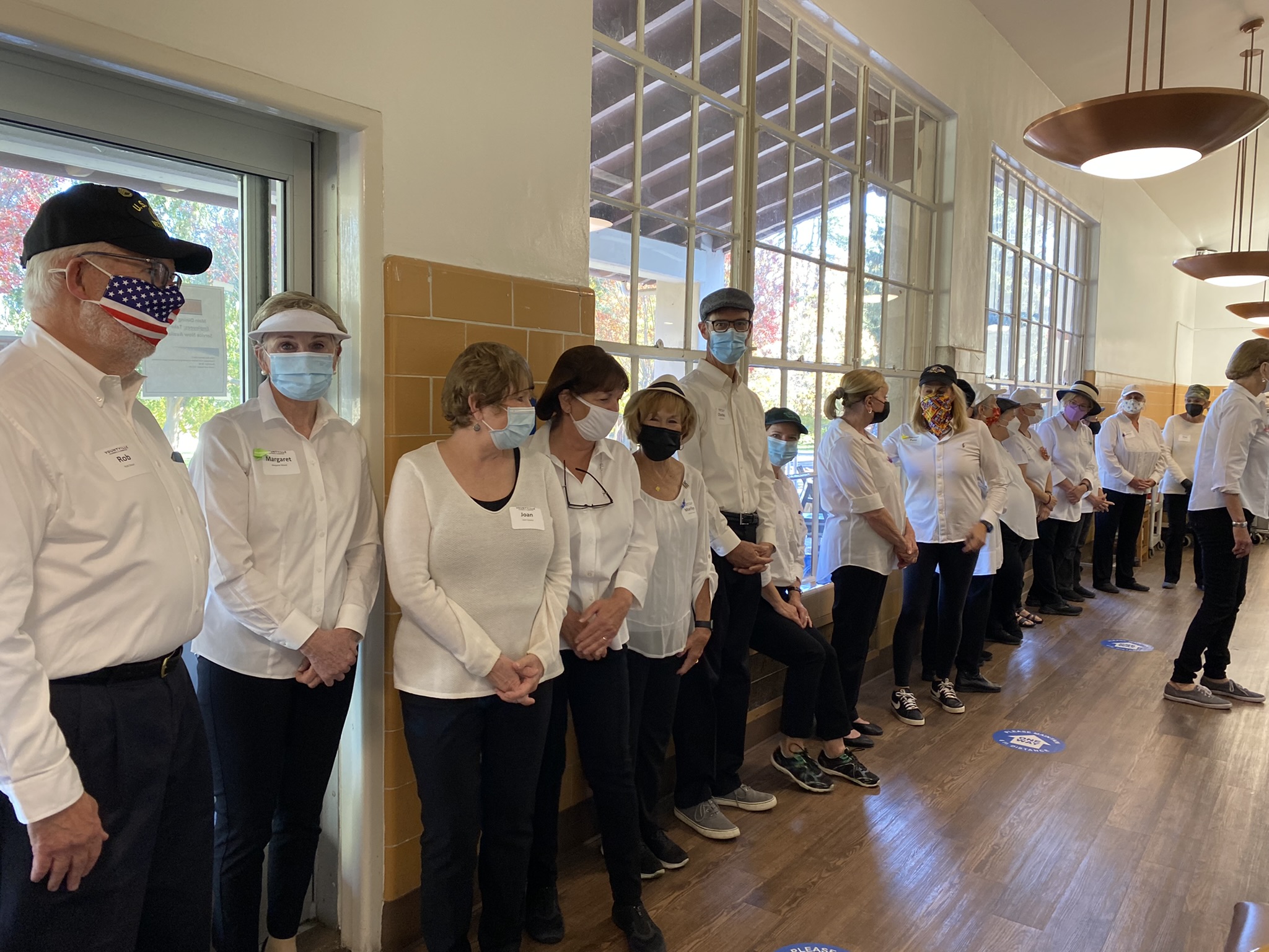 Volunteers Line up to serve